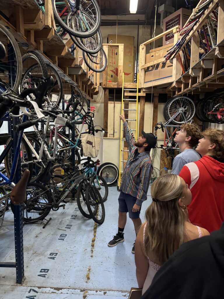 students at bike shop